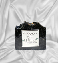 Load image into Gallery viewer, Charcoal Turmeric Oatmeal Tea Tree Mint Handmade Soap
